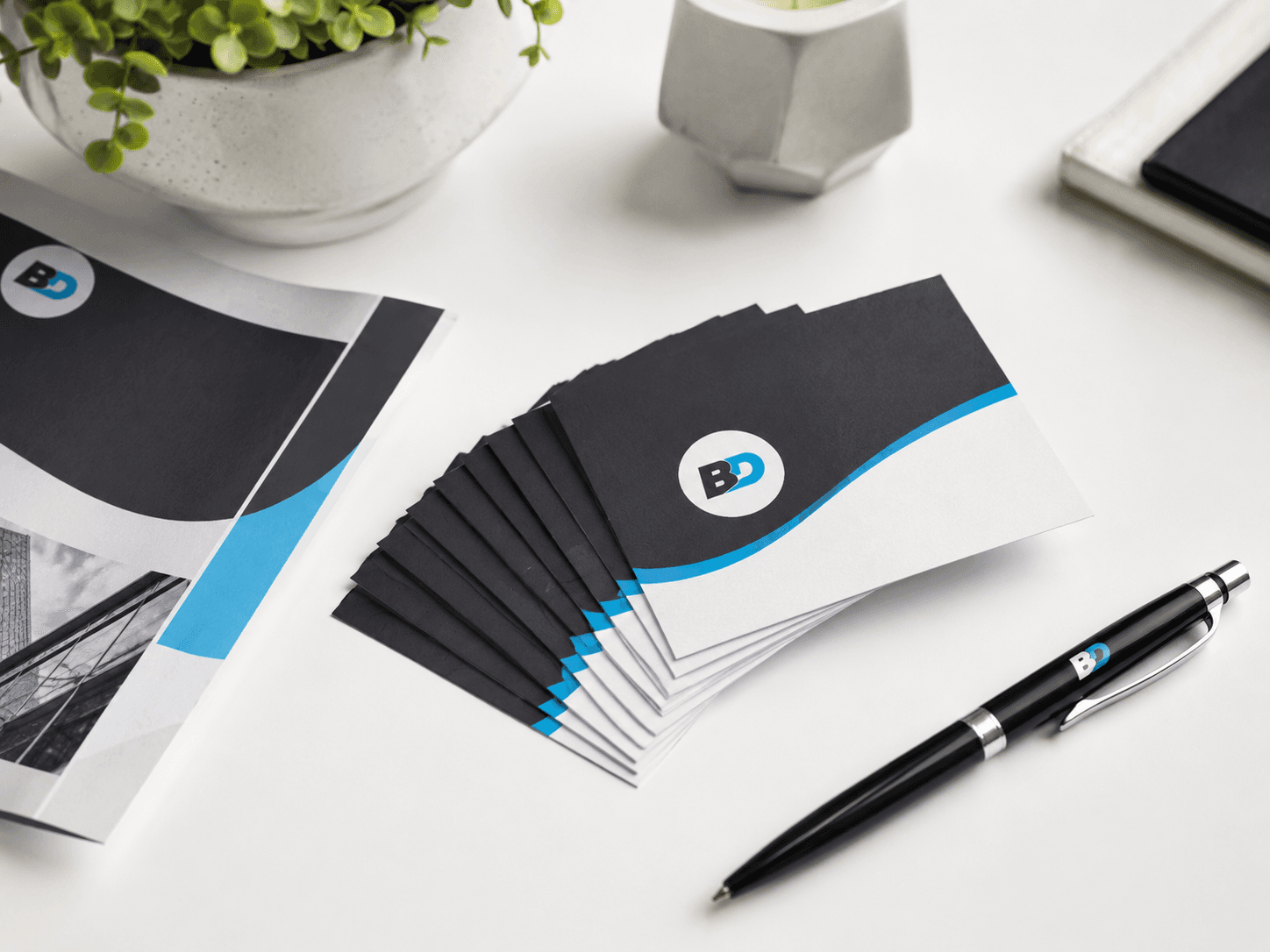 Printed materials including business cards, flyers, and brochures
